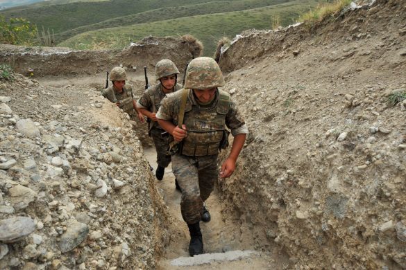 Armenian soldiers of the self-proclaimed republic of Nagorno-Karabagh walk in a trench at the frontline on the border with Azerbaijan near the town of Martakert. EU president Herman Van Rompuy urged last week enemies Armenia and Azerbaijan to end frontline clashes that have raised fears of renewed war over the disputed region of Nagorny Karabakh. Armenia-backed separatists seized Karabakh from Azerbaijan in a war in the 1990s that left some 30,000 dead, and no final peace deal has been signed since the 1994 ceasefire. (Karen Minasyan/Getty Images)