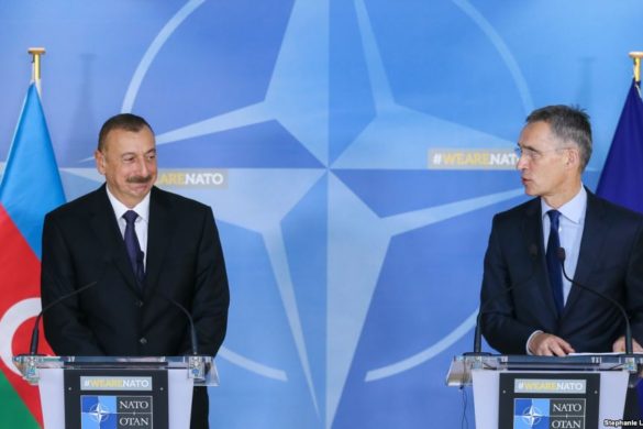 epa06345201 Azerbaijan's President Ilham Aliyev (L) and  North Atlantic Treaty Organization (NATO) Secretary General Jens Stoltenberg (R) give a press conference at the end of a meeting at NATO headquarters in Brussels, Belgium, 23 November 2017.  EPA-EFE/STEPHANIE LECOCQ