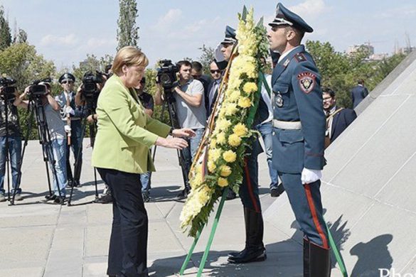 Merkel-Genocide-1