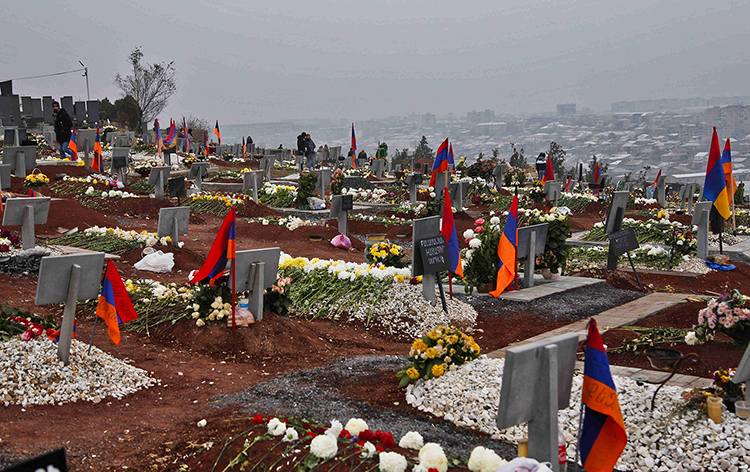 New graves for Armenian soldiers killed in the recent war over Nagorno-Karabakh cover the hillside at Yerablur Military Memorial Cemetery on Nov. 30, 2020. Jack Losh for Foreign Policy