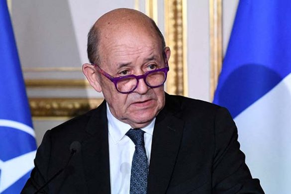 FILE PHOTO: French Foreign Affairs Minister Jean-Yves Le Drian speaks at a news conference following a meeting with NATO's Secretary General and the French defence minster in Paris, France December 10, 2021. Bertrand Guay/Pool via REUTERS/File Photo