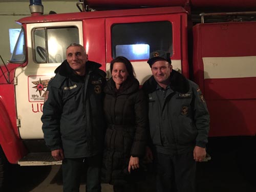Chief Radik, Jamie Kolar, and the on-duty fire captain at the Ashotsk Fire Station